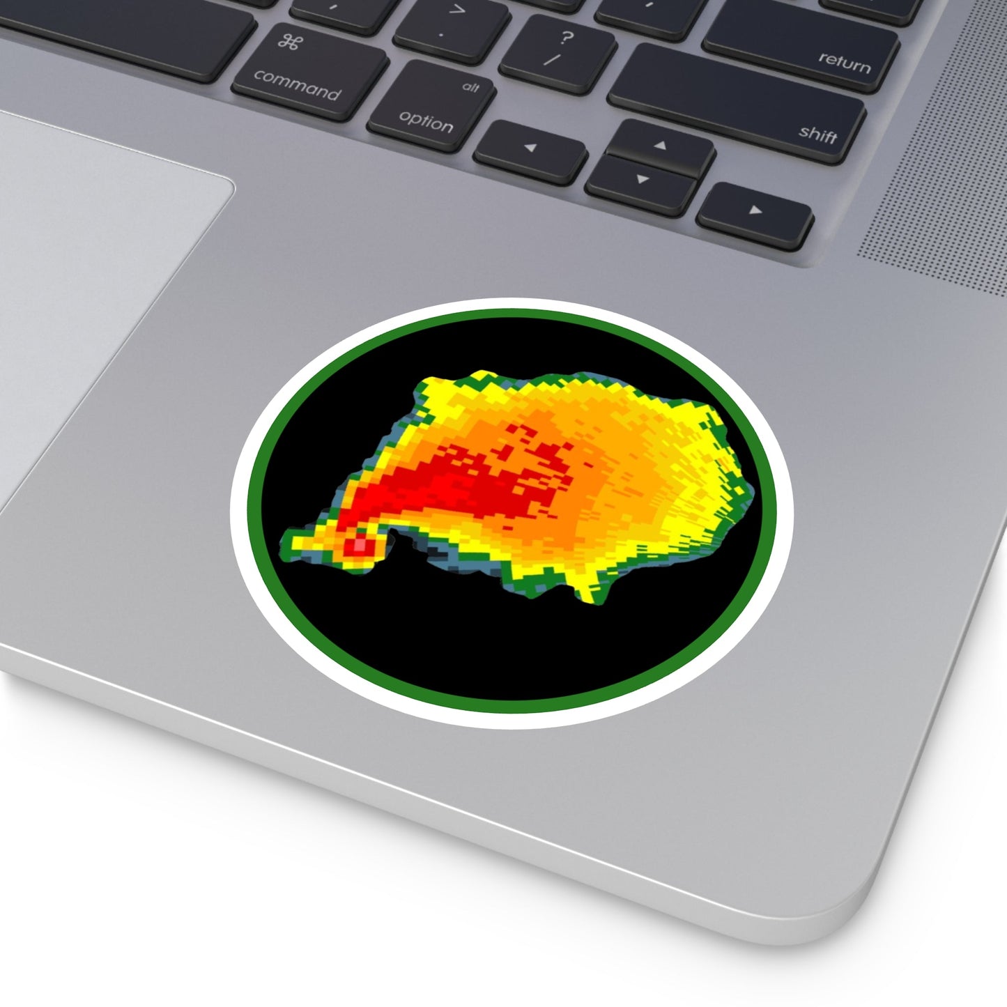 Radar reflectivity sticker on laptop showing colorful tornado hook echo design.