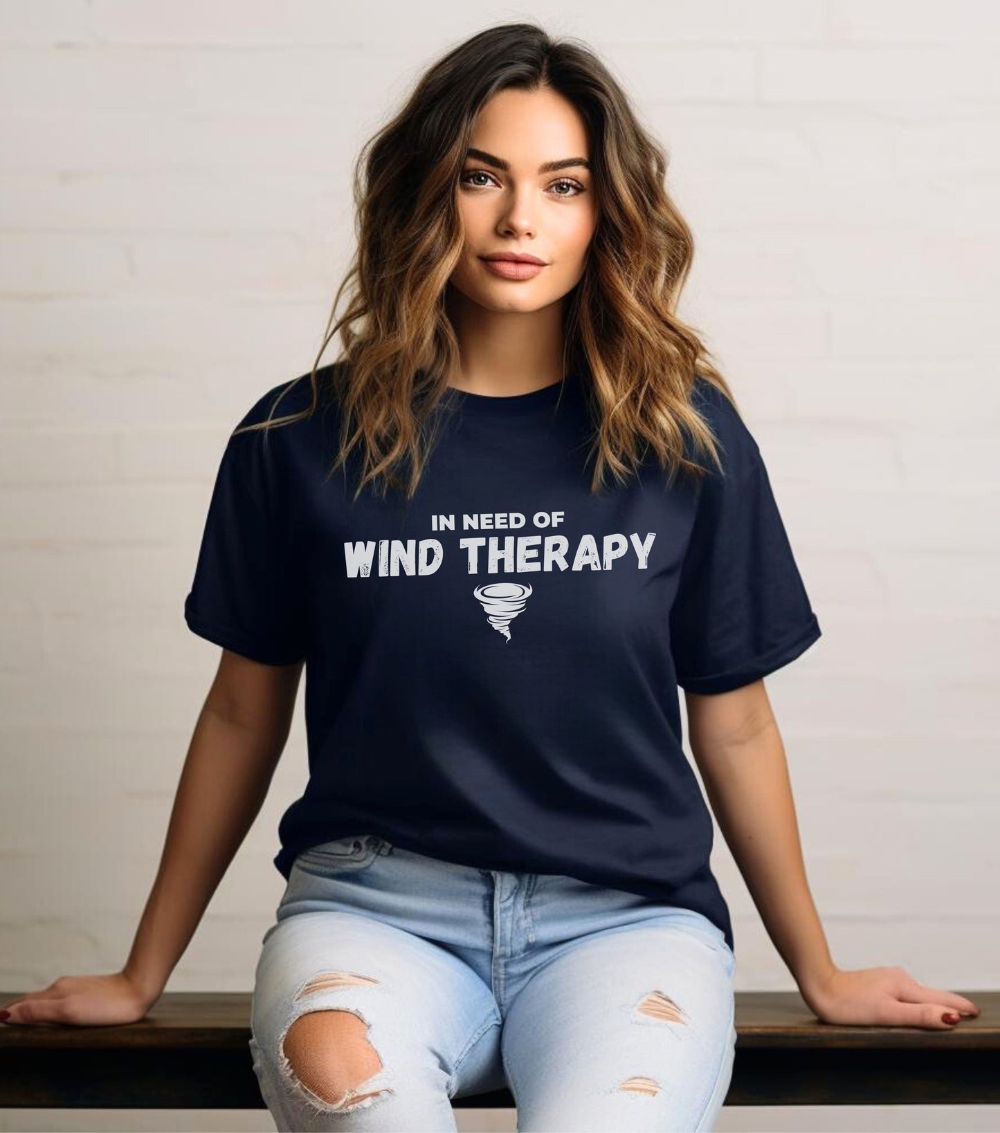 Storm Custom Chaser T-Shirt with "In Need of Wind Therapy" quote worn by a person, ideal for storm chasers.