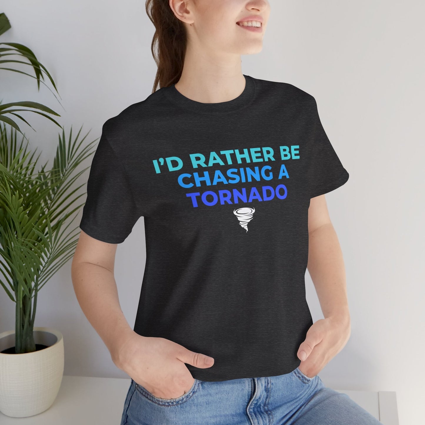Storm Chasing T-Shirt with "I'd Rather Be Chasing A Tornado" quote, perfect for meteorology enthusiasts, made from 100% cotton.