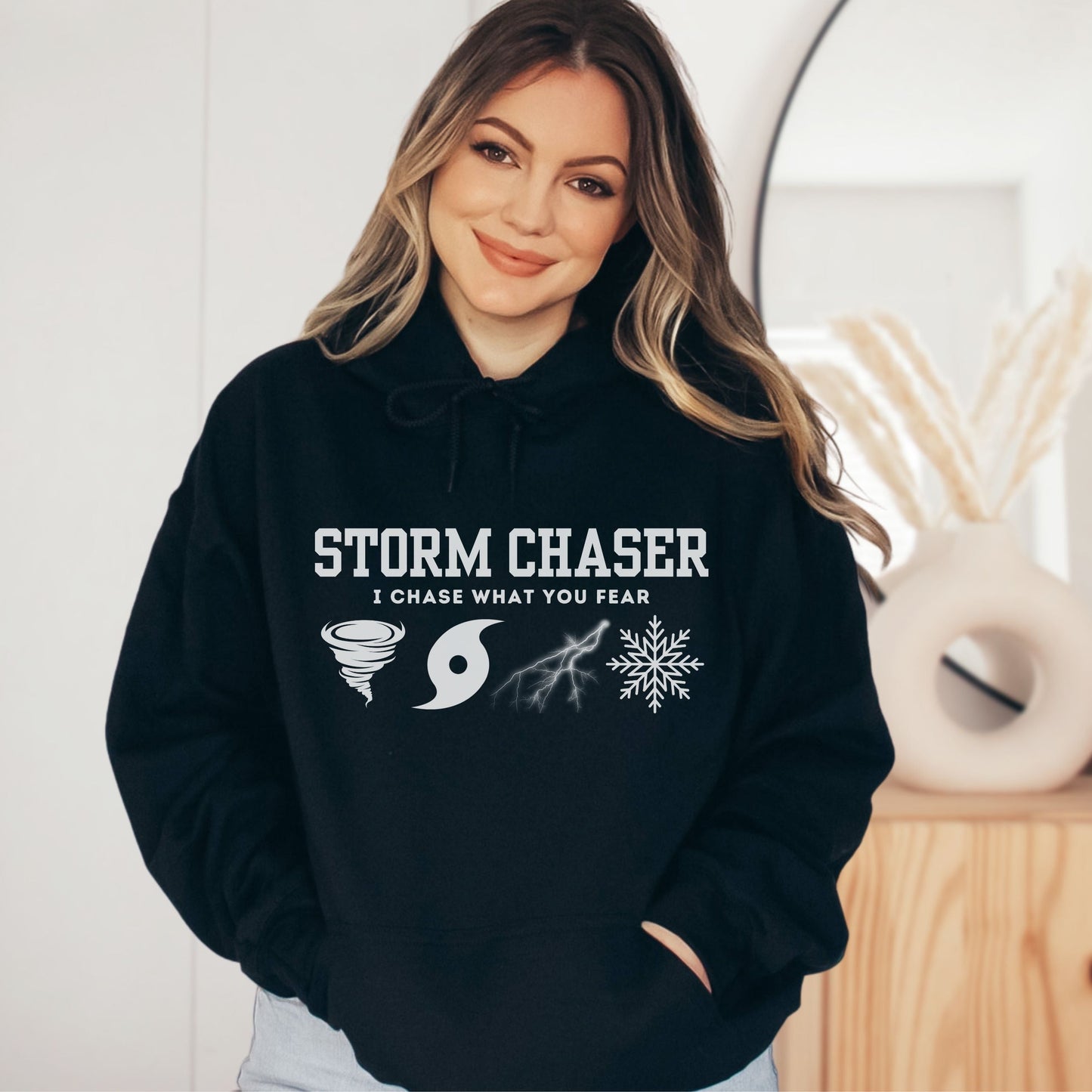 Storm Chaser Hooded Sweatshirt - "I Chase What You Fear" design, ideal for weather enthusiasts.