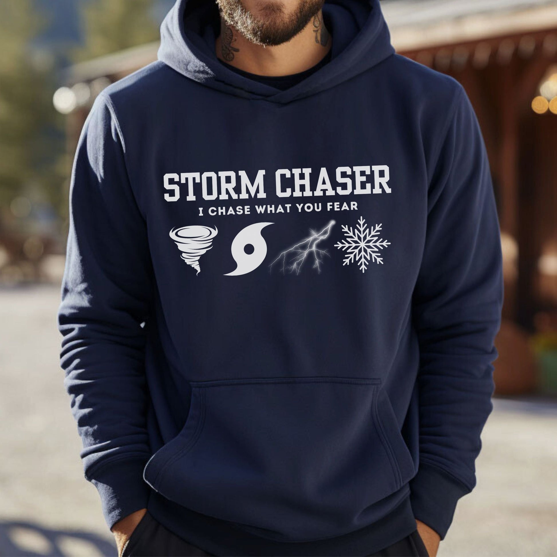 Storm Chaser Hooded Sweatshirt with "I Chase What You Fear" design, ideal for weather enthusiasts.