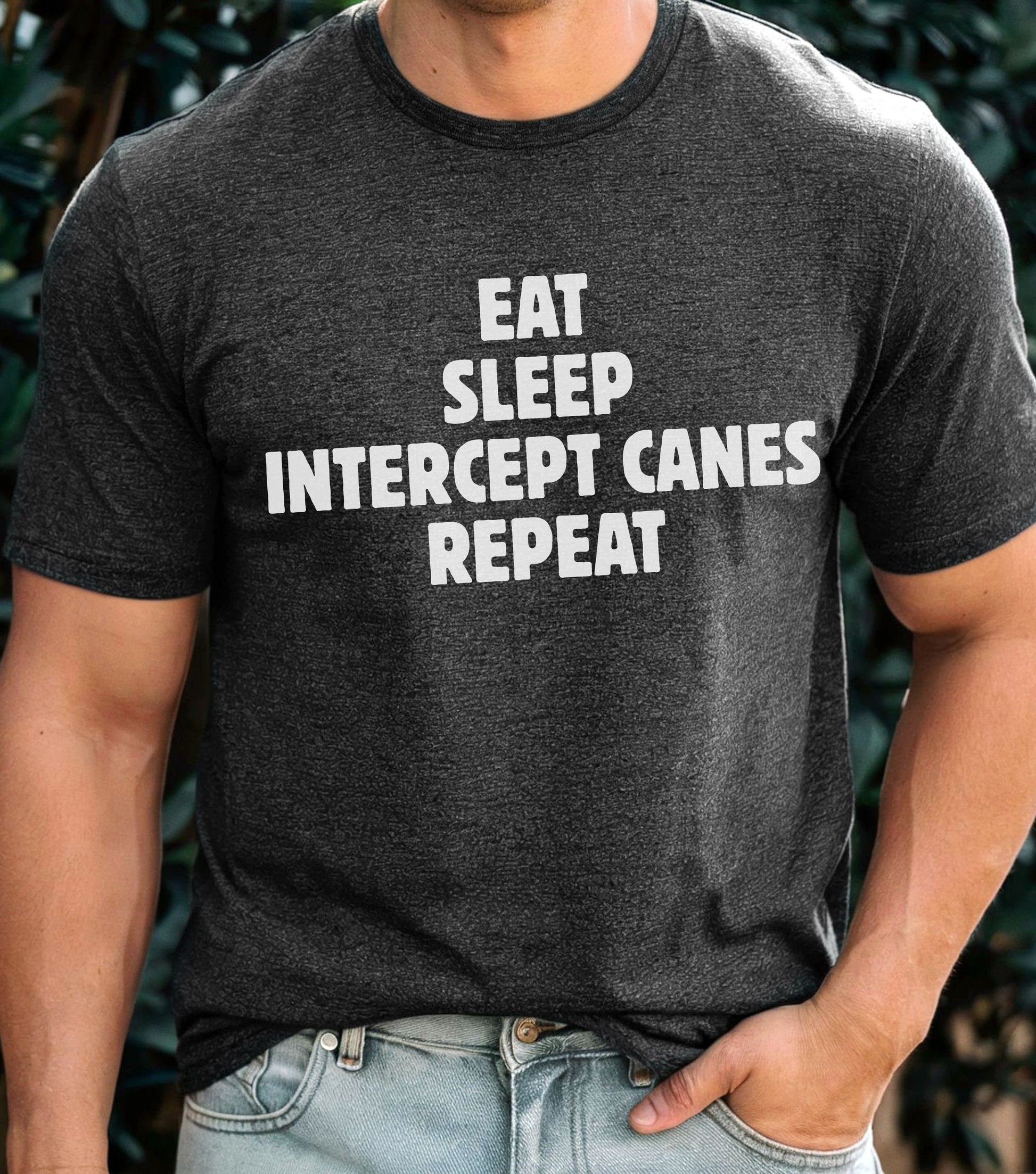 Storm Chaser T-Shirt featuring "Eat Sleep Intercept Canes Repeat" text for weather enthusiasts.
