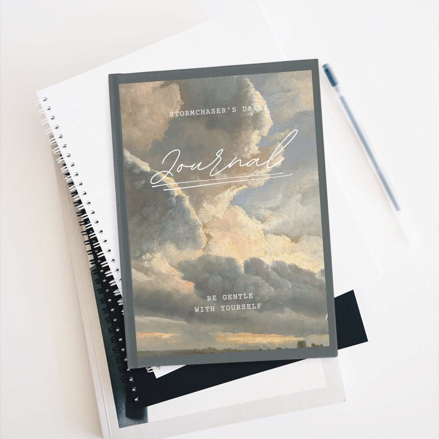 Storm Chaser's Daily Journal with cloud cover, for weather enthusiasts and reflections.