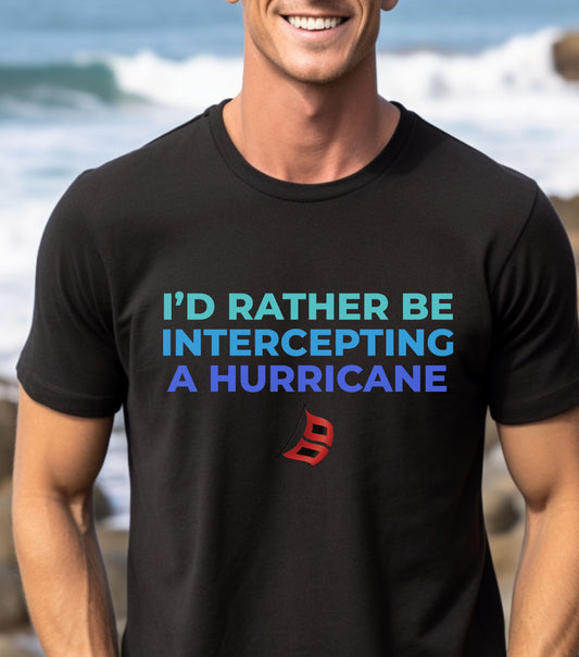 Storm Chasing T-Shirt with "I'd Rather Be Intercepting A Hurricane" quote, ideal for storm enthusiasts.