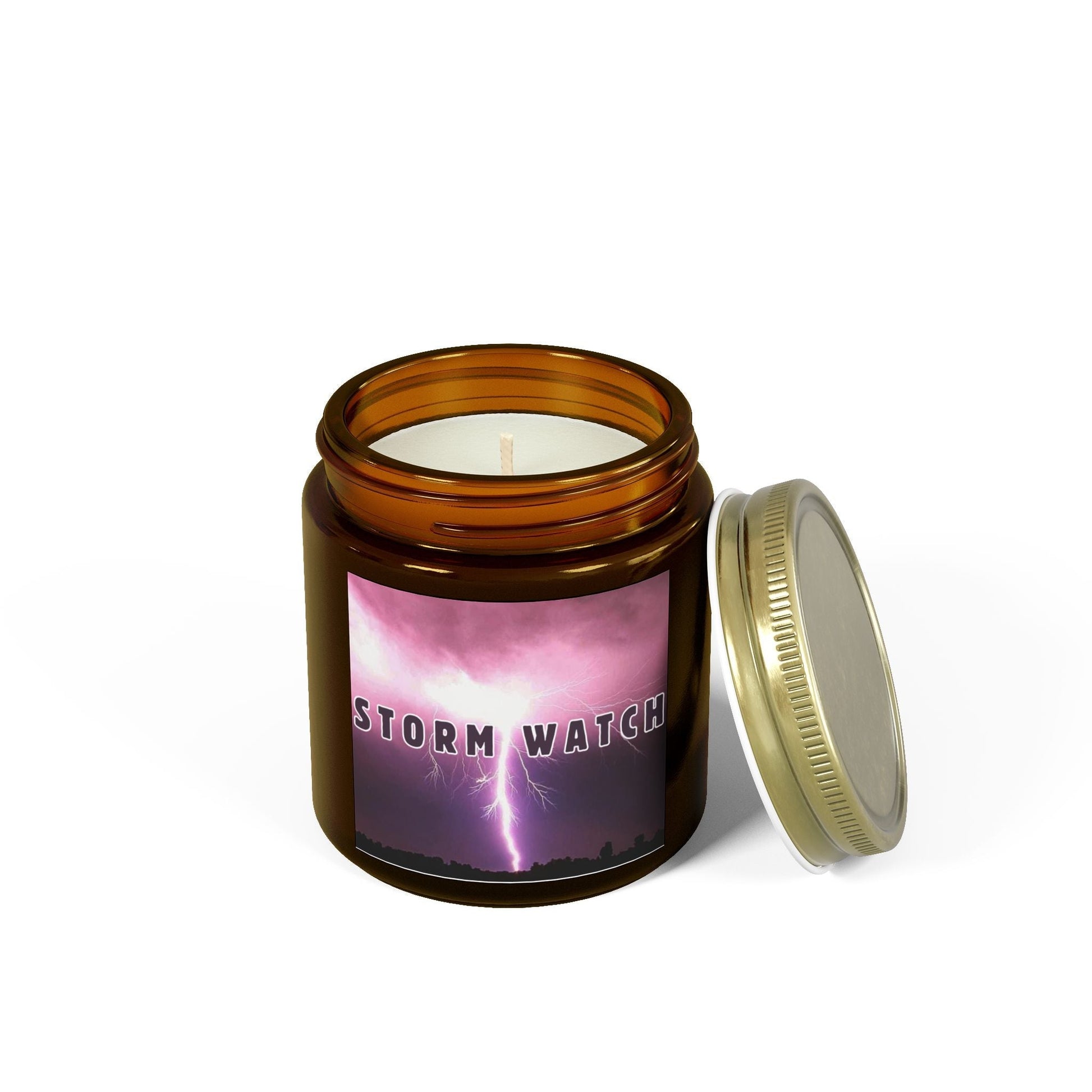 Storm Watch Scented Candle in amber jar with lightning label, lid ajar.