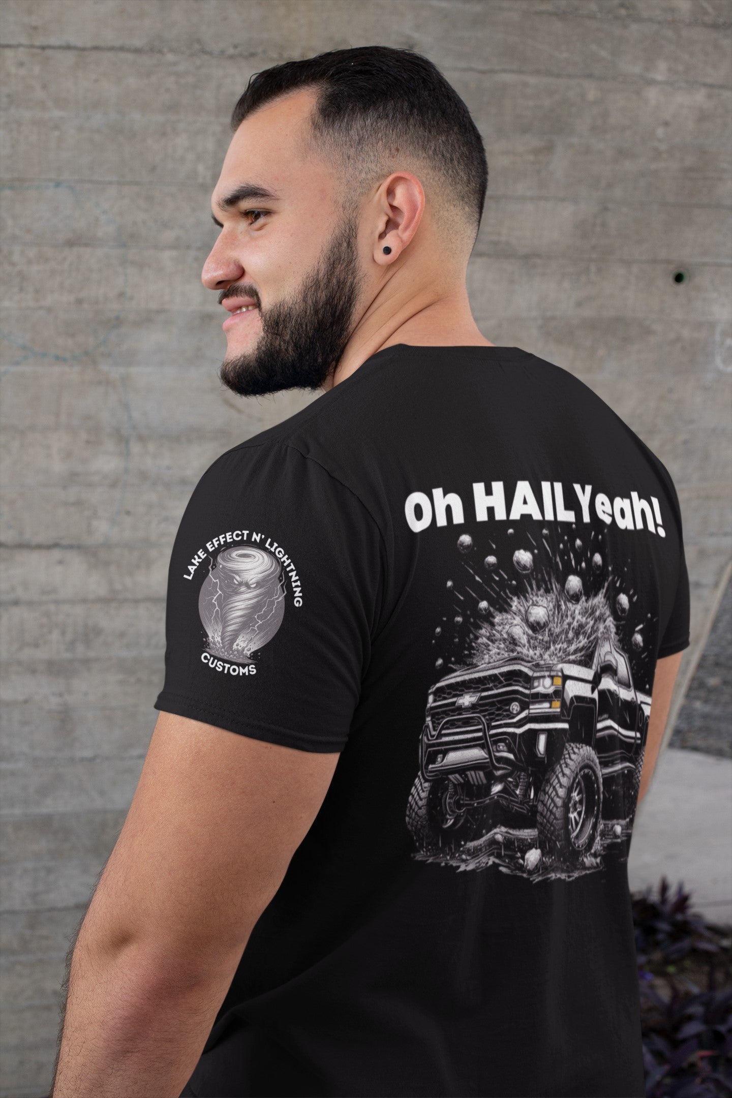 Funny storm chaser T-shirt with "Oh Hail Yeah" text and Chevy Silverado design.
