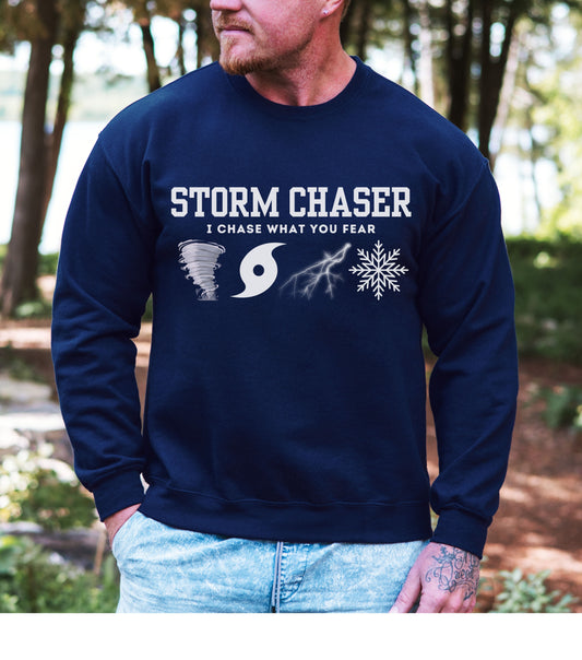 Storm Chaser Sweatshirt featuring "I Chase What You Fear" quote, perfect for meteorologists and storm enthusiasts.